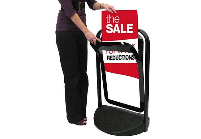 Water weighted base for swing pavement display