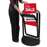 Water weighted base for swing pavement display